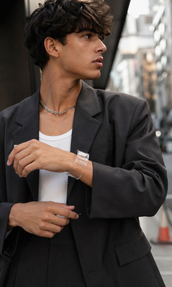 Balenciaga gaffer bangle worn on wrist street style fashion
