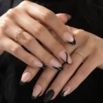 edgy black french tip almond nails 2026 designs on nude base