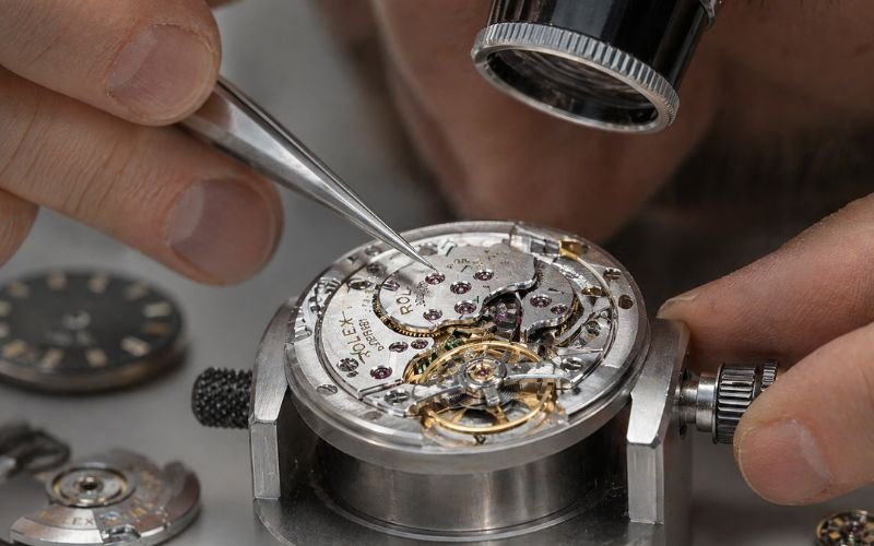 Rolex movement disassembly during professional servicing
